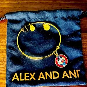 Alex and Ani almost new “Wonder Woman” bracelet in gold.